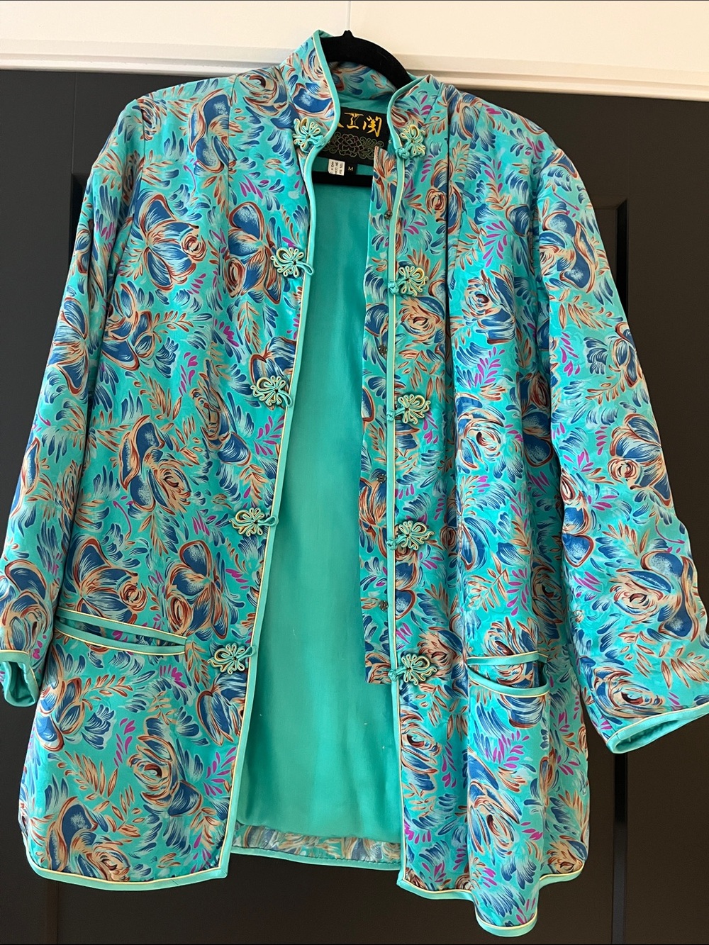 Turquoise padded silk jacket
